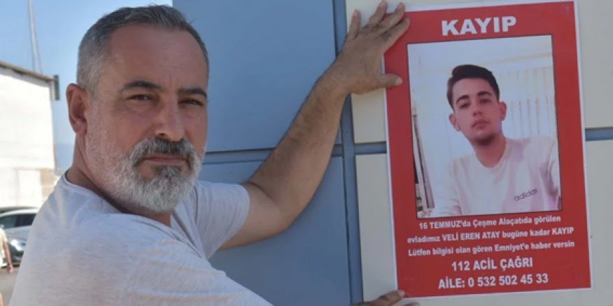Çeşme'de kaybolan 19 Yaşındaki Veli Eren'i afiş yapıştırarak arıyorlar